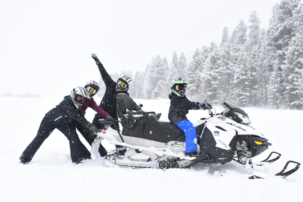 Family on a Sunlight Snowmobile Adventure Tour