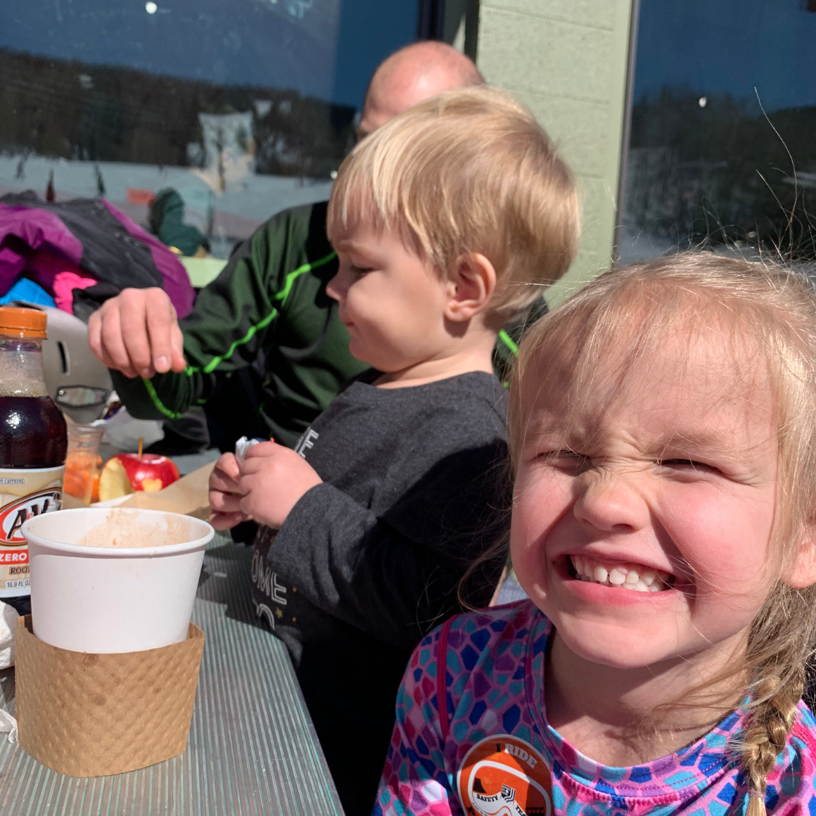family enjoys snack time at sunlight mountain