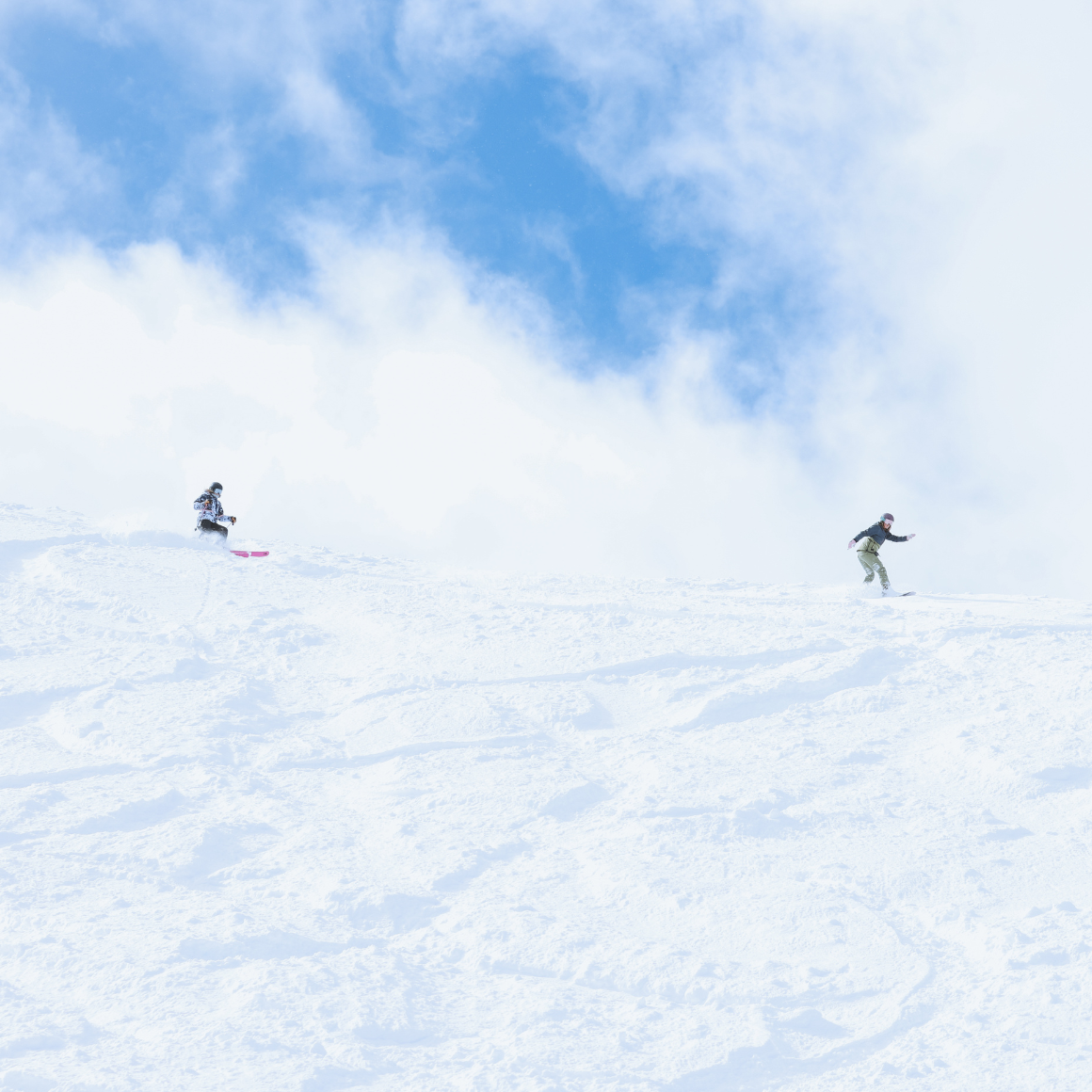 two skiiers on mountain in glenwood springs